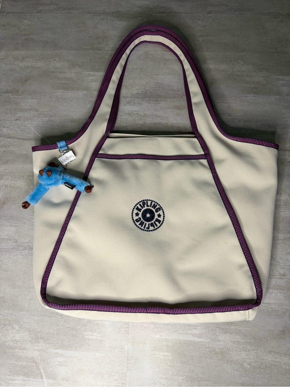 Kipling Cream Canvas Tote with Purple Trim and Blue Monkey Keychain